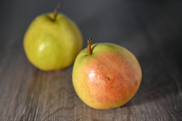 two juicy pears on a wooden table, studio shooting 5