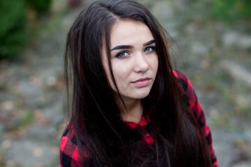 Beautiful girl with shiny black hair and black eyes. Miss from Ukraine