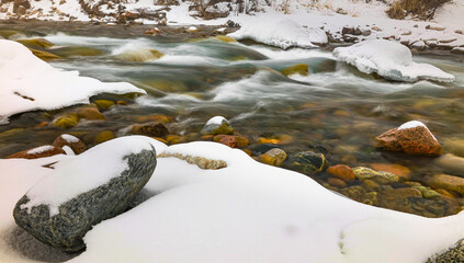 water flowing in the snow