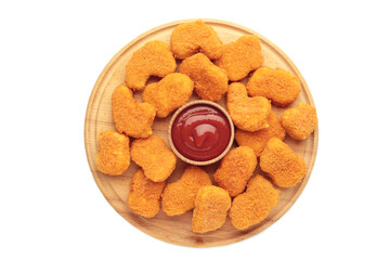 Chicken nuggets with ketchup on cutting board isolated on white background.
