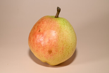 juicy pear on a beige background studio shooting 1