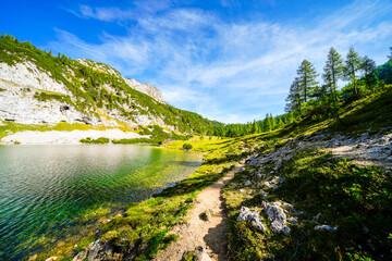 Schwarzensee on the high plateau of the Tauplitzalm. View of the lake at the Totes Gebirge in...