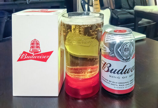 Calgary, Alberta, Canada. Aug 10, 2023. A Hockey promotional Budweiser brander glass beer with a red light.