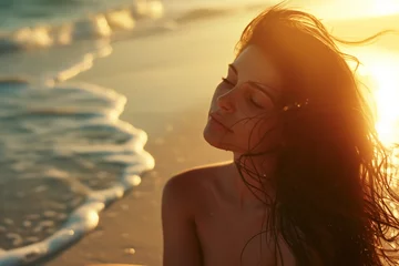 Foto auf Acrylglas Sonnenuntergang am Strand beautiful girl on the beach at sunset