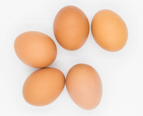 Fresh Chicken Eggs on white background.