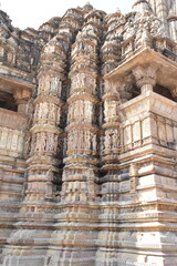 This is photo of temple at Khajuraho in India. It is example of finest art in the world. 