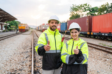 Team of engineer railway wearing safety uniform and helmet under checking train ,wheels and control system for safety transportation. Maintenance cycle concept.