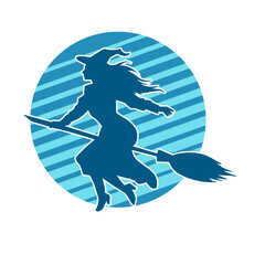 Silhouette of a female witch ride broom