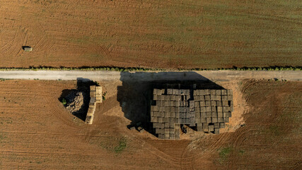 overhead view of stacked hay blocks