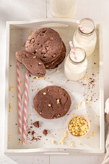 Milky and crunchy chocolate cookies with white chocolate chip.