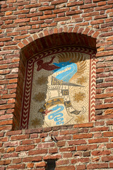 Visconti Coat of Arms on the wall of the Castello Sforzesco (Sforzesco Castle) on a clear sunny fall day in Milan, Italy