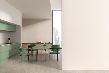 White and green kitchen interior with island, table and blank wall