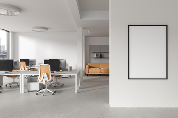 White and orange open space office interior with poster