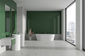 Green bathroom interior with tub and double sink