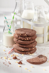 Milky and crunchy chocolate cookies as after school milky snack.