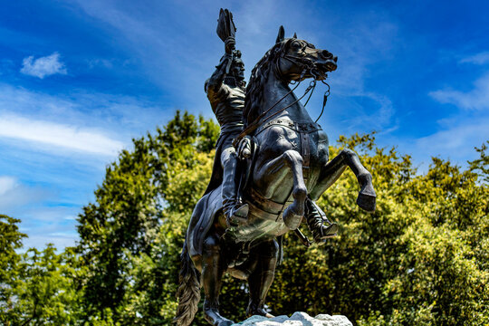 Andrew Jackson monument on horseback in Lafayette Square in front of the White House and the famous obelisk in Washington DC, USA.