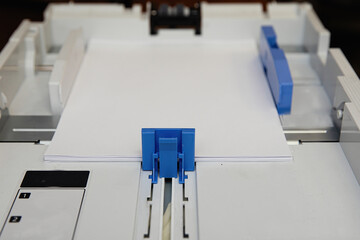 The printer's paper feed tray.