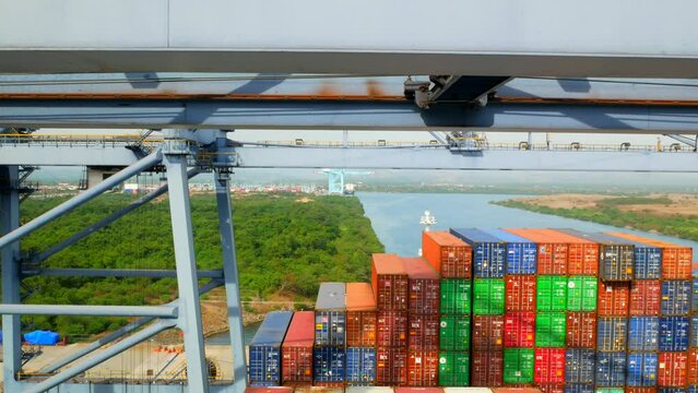 Lazaro Cardenas, Mexico - 18.03.2023 Container ship has loading operations with few gantry cranes in Lazaro Cardenas Container Terminal during the the day time.