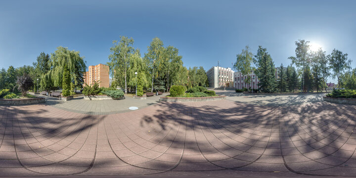 seamless spherical hdri 360 panorama view on square with trees near residential area with multi-storey and office building and urban development in equirectangular projection, AR VR content