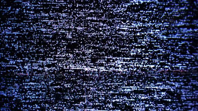 Old damaged VHS tape playing, over noise from an analog TV. Vintage background 4k footage. Abstract digital glitch damage with stylized noise.