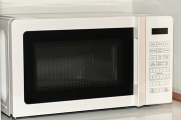 Fototapeta premium white microwave in the kitchen 1