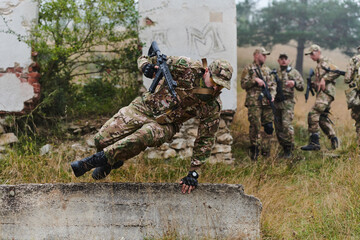 A highly trained elite military unit, clad in camouflage, skillfully navigates through perilous...