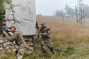 In a high stakes mission, a specialized military unit executes a tactical operation to secure a dangerous house where terrorists are believed to be hiding, showcasing precision and coordinated