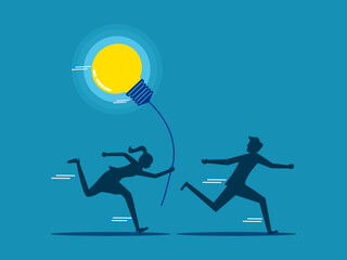 businessman hands off a light bulb to another person