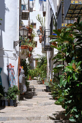 Colorful streets of Peñiscola with its flowers and balconies