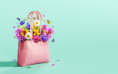 Pink leather bag full of colorful spring flowers on turquoise blue background with copy space. 3D Rendering, 3D Illustration - 721224201