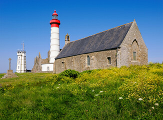 Fototapeta na wymiar Chapel, lighthouse and semaphore at Saint-Mathieu is a headland located near Le Conquet in the territory of the commune of Plougonvelin in department of Finistère in France 