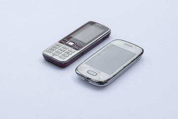 Old cell phone on white background, vintage cell phone