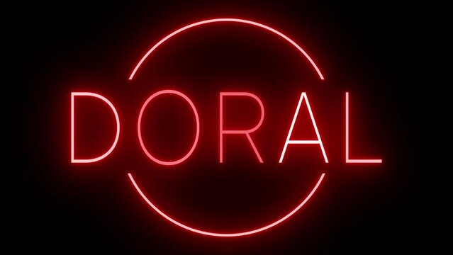 Flickering red retro style neon sign glowing against a black background for DORAL