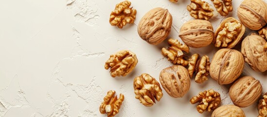 Crunchy Walnuts Lie Serenely on a Light-Colored Background, Bringing a Captivating Flair to the Image