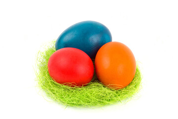 easter eggs in a basket on a white background
