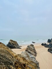 Rocky ocean coast, mist and fog at the ocean bay, rocks at the ocean coast, impressive