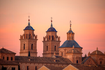 Fototapeta na wymiar View of the towers and dome of the baroque Jerónimos Monastery in Murcia, Spain on a nice warm day