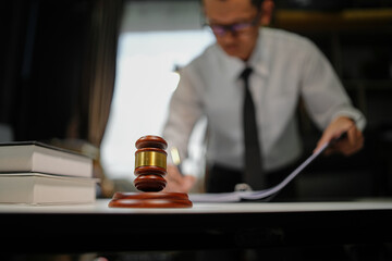 Partner lawyers or attorneys discussing a contract agreement. Successful businessmen have a contract in place to protect it,signing of modest agreements form in office...