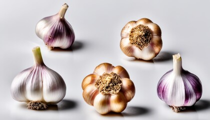 Four garlic bulbs in a row