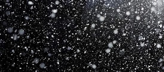 High quality, dense falling snow on black background. Snowfall with transparency.