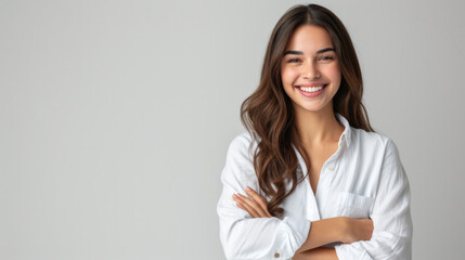 Smiling happy woman with arms crossed