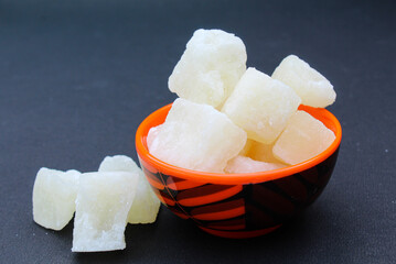 Indian sweet petha or Agra petha in a bowl on black background 