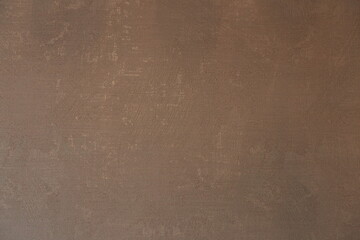 Photo of textured beige paperhanging.