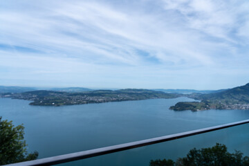 Obraz premium View of the blue Vierwaldstätter Lake in Switzerland from above on a sunny day 