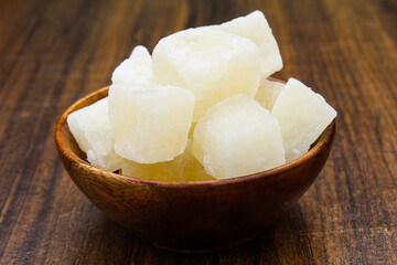 Indian sweet petha or Agra petha in a wooden bowl side view 