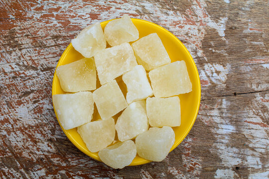 Indian sweet petha or Agra petha in a plate on wooden background 