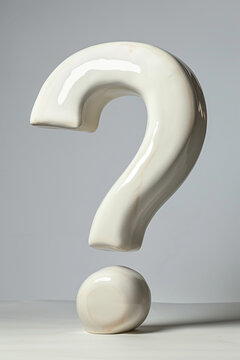 ceramic ? question mark faq white sculpture isolated on plain gray studio background