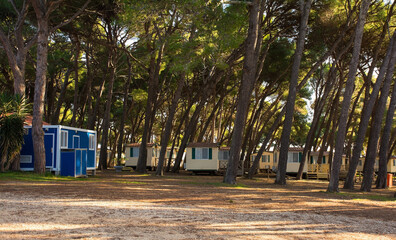 Mobile holiday homes stand empty in winter in Kasteja Forest Park - Park Suma Kasteja - a coastal holiday park in Medulin in Istria, north east Croatia