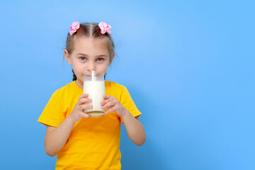 girl child with milk blue background