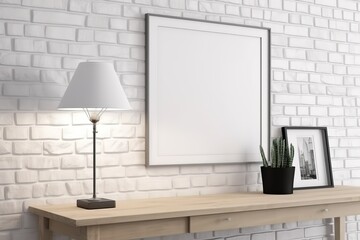 Minimalist home decor with blank frame, candles, and plant against a white brick wall.